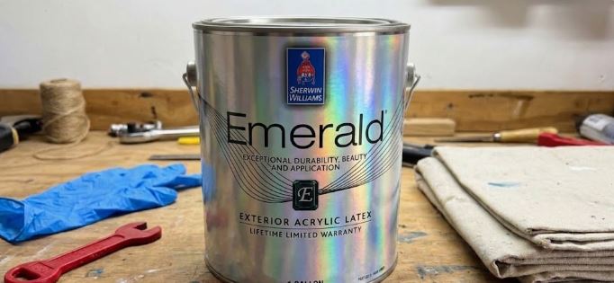 gallon can of Sherwin-Williams Emerald Exterior Acrylic Latex on a workbench